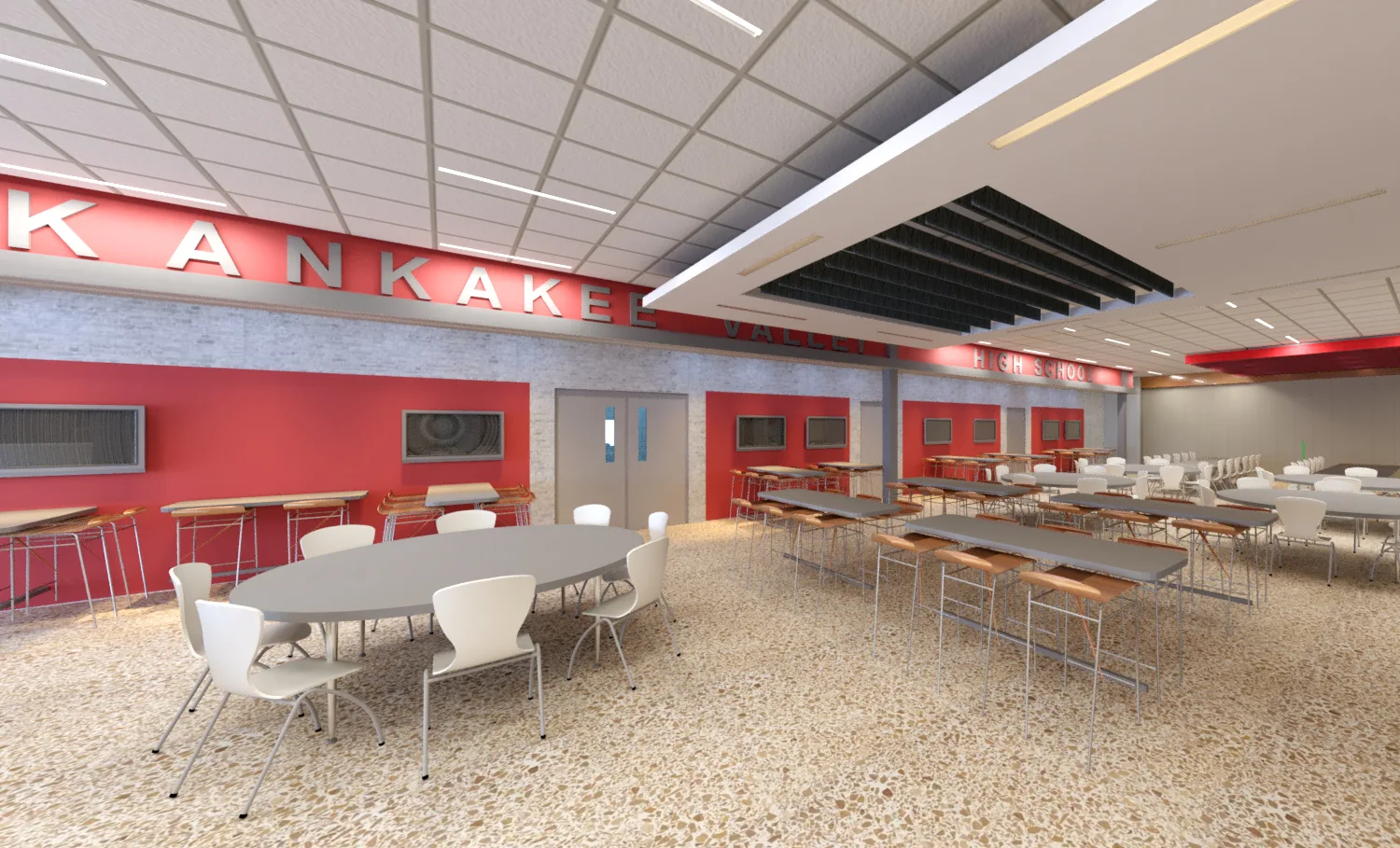 A spacious cafeteria area with white chairs and various types of tables. The walls are red with rectangular windows, and the ceiling has white panels and a black recessed section.